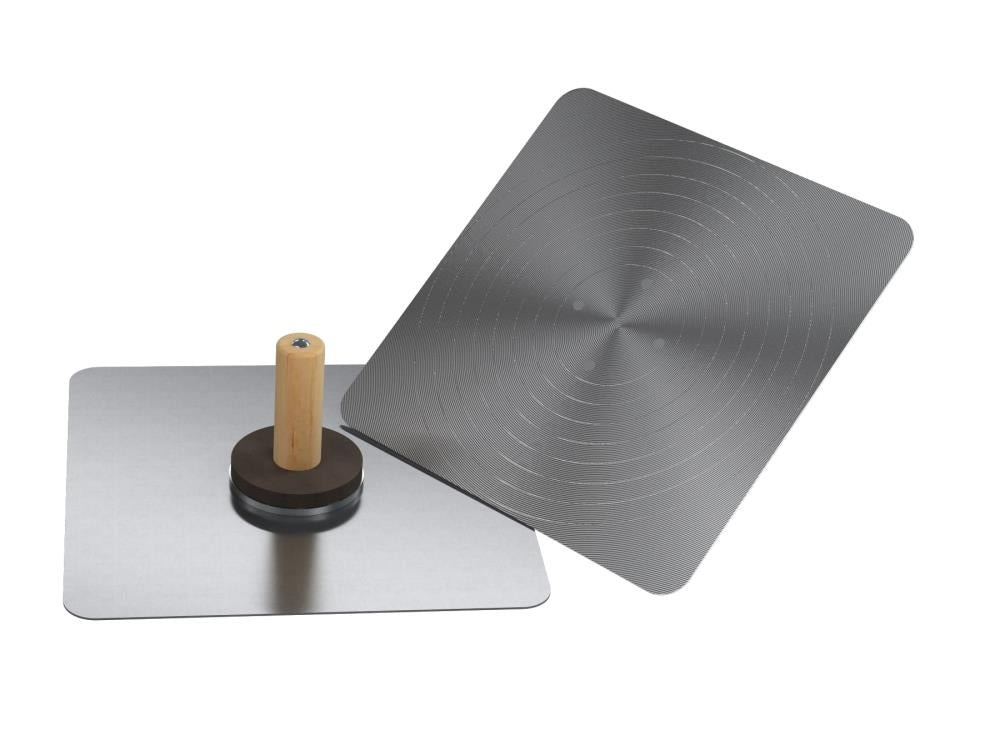 A single green leaf against a white background.