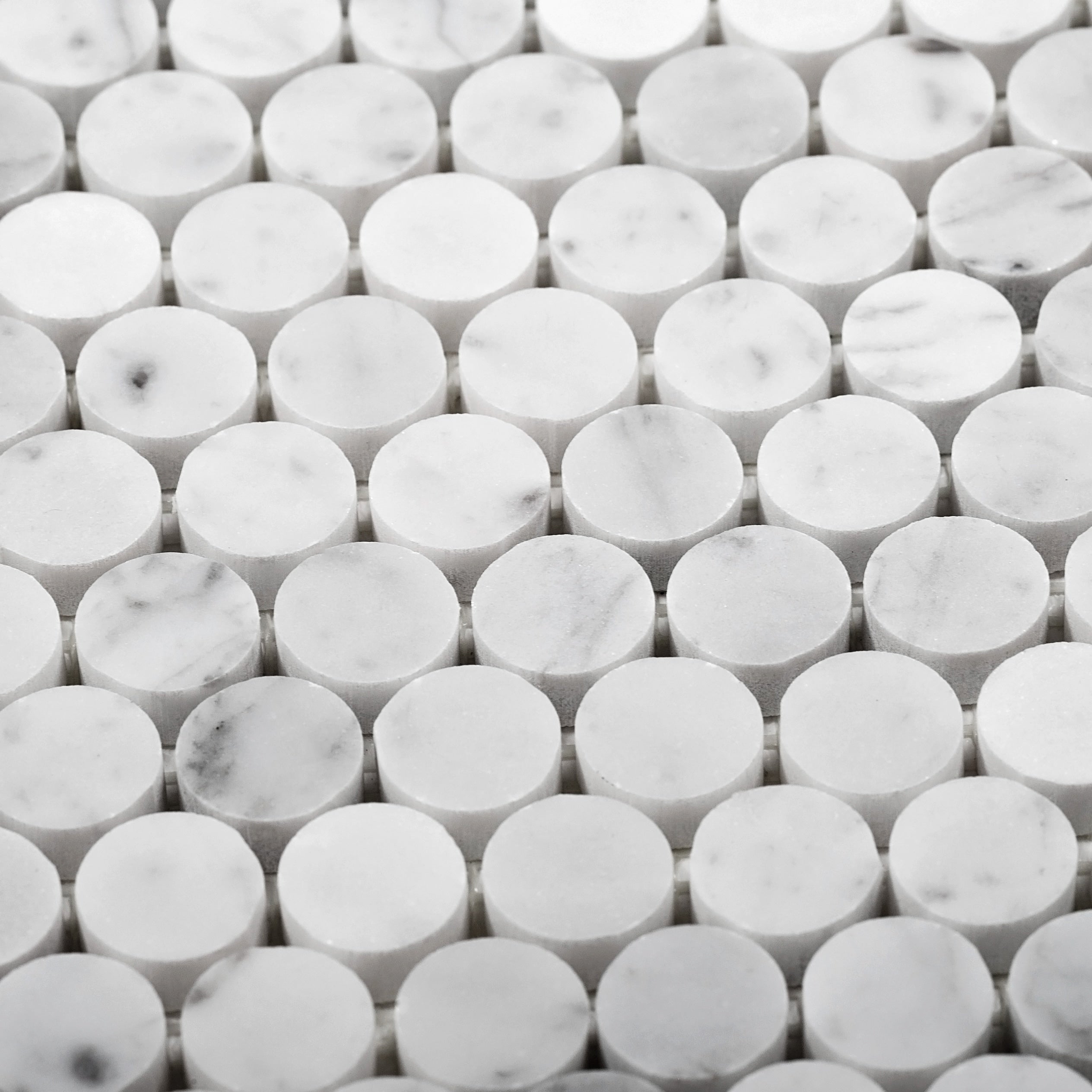A single green leaf against a white background.