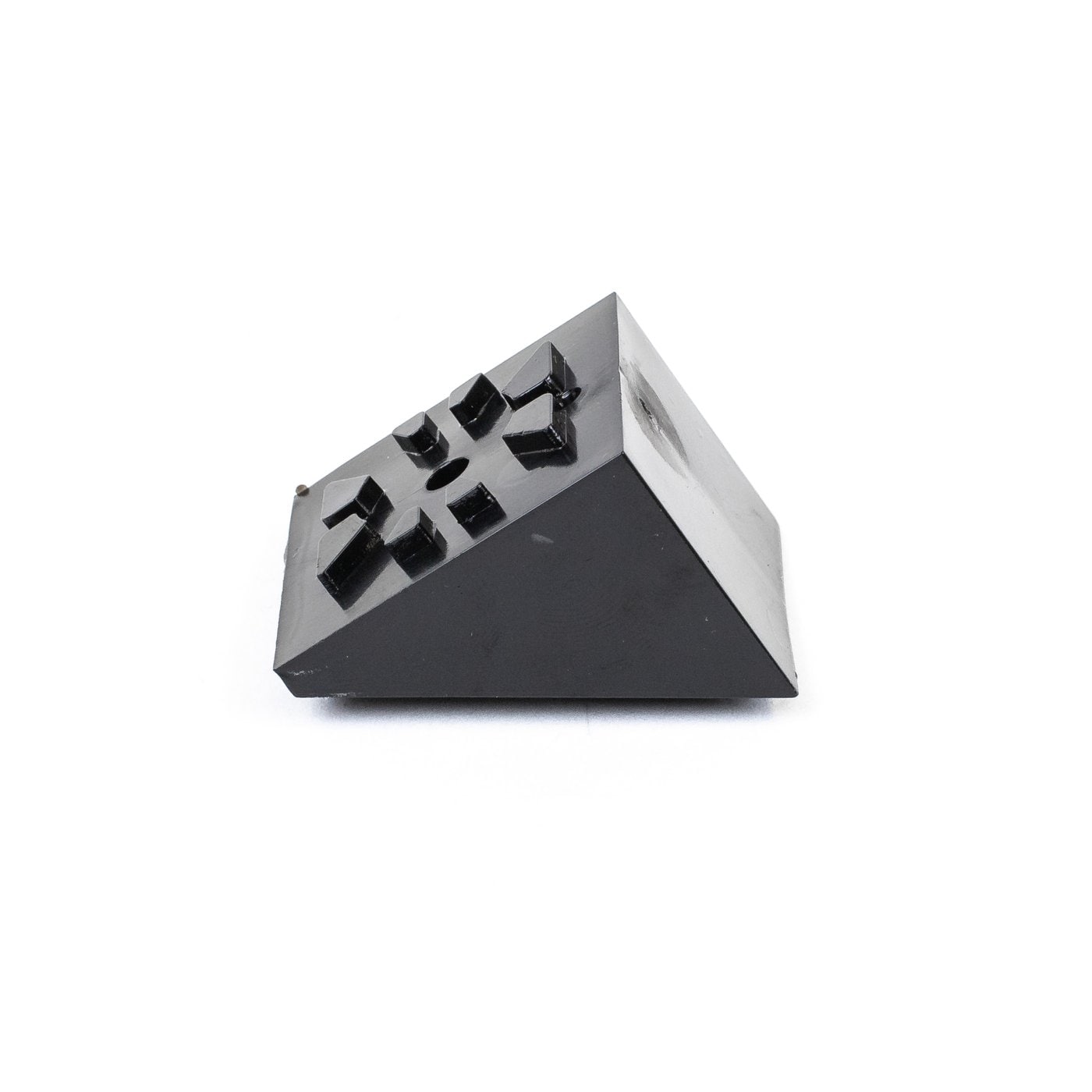 A single green leaf against a white background.