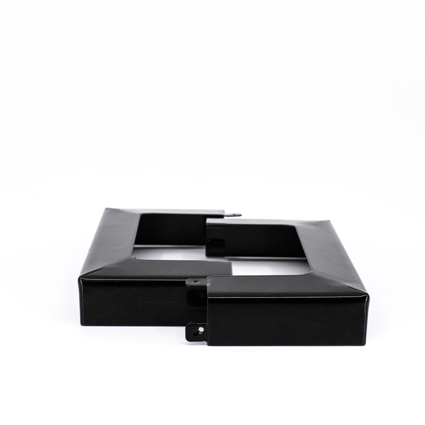 A single green leaf against a white background.