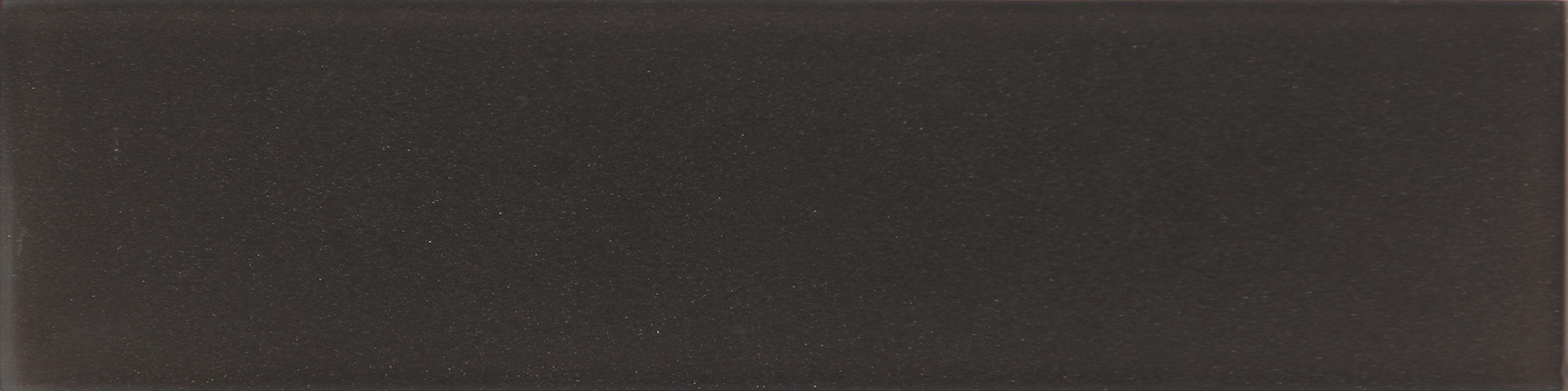 A single green leaf against a white background.