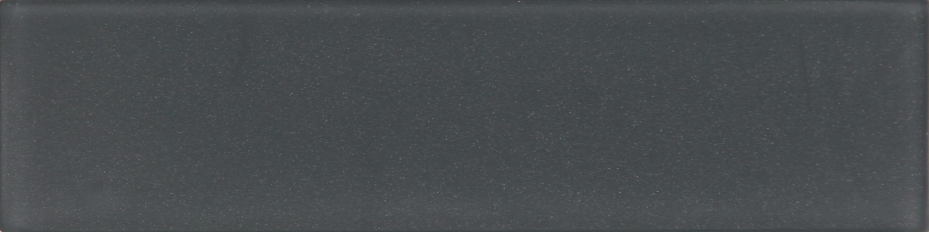 A single green leaf against a white background.