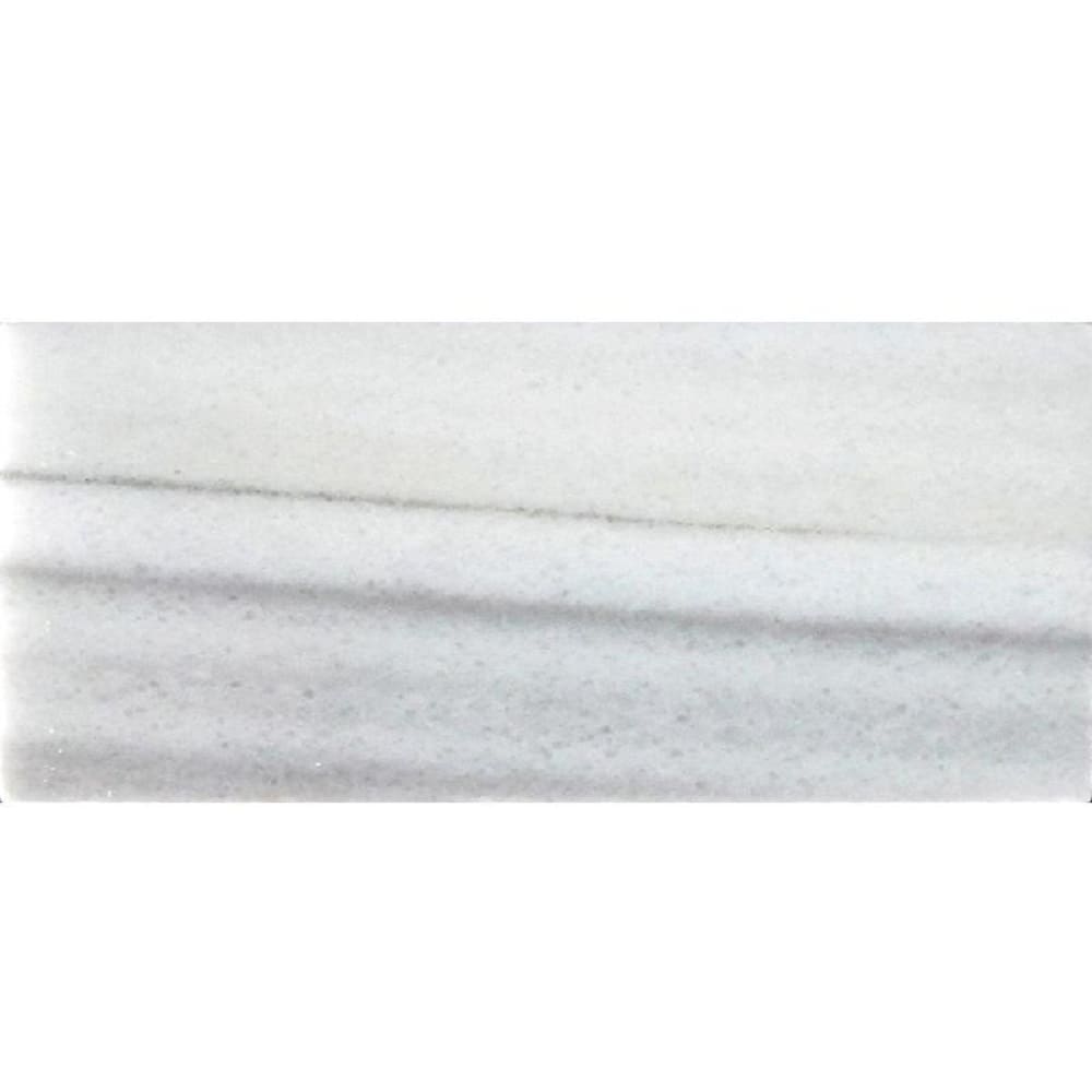 A single green leaf against a white background.