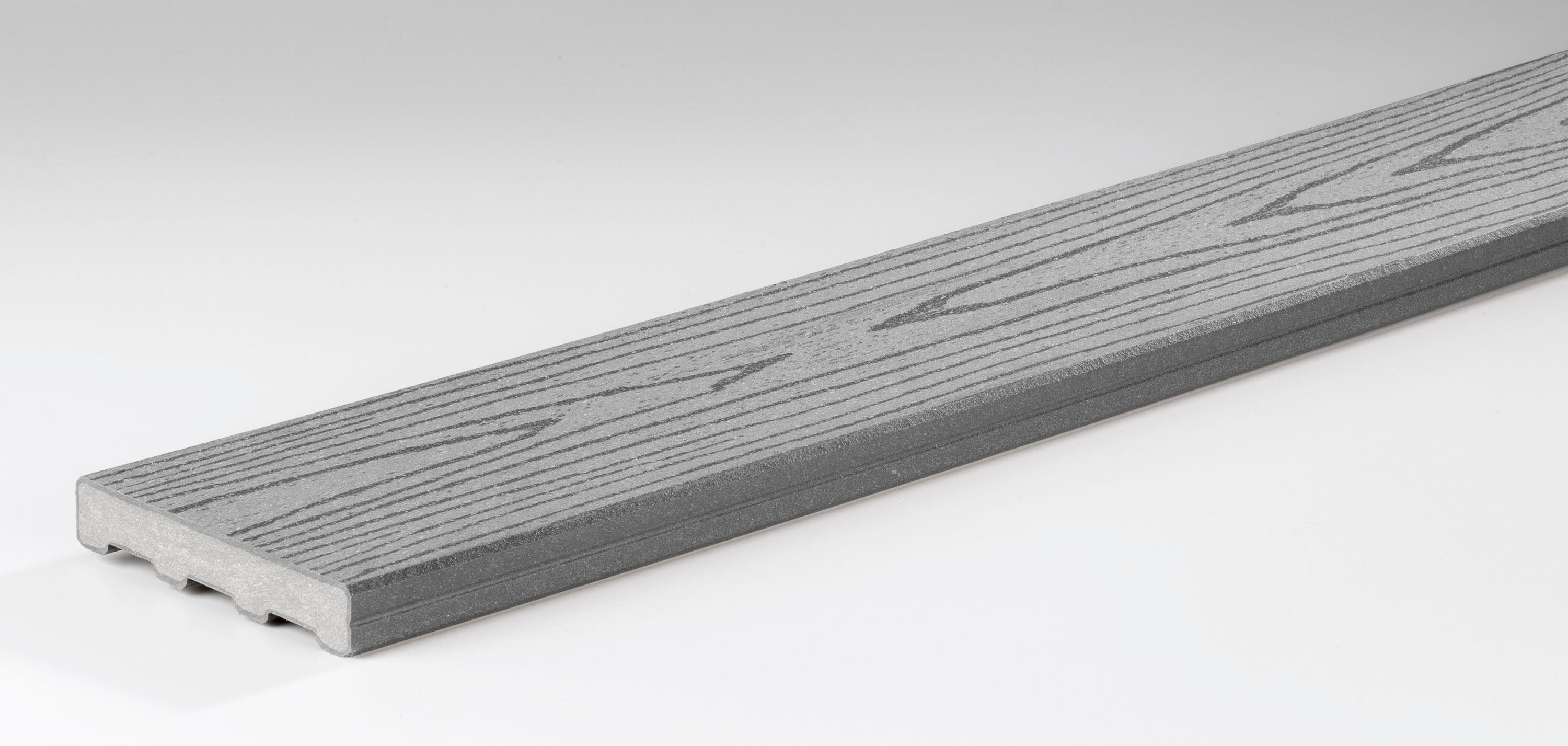 A single green leaf against a white background.