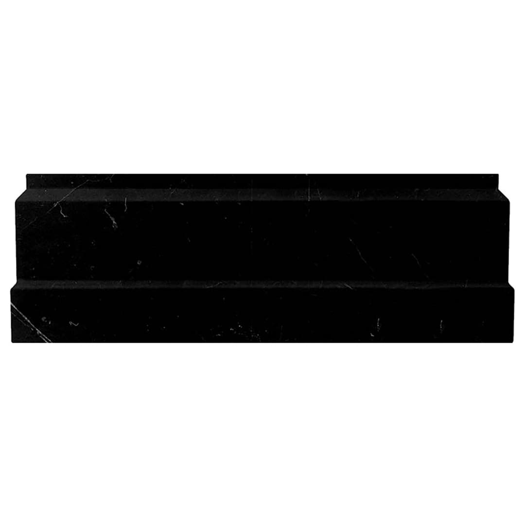 A single green leaf against a white background.