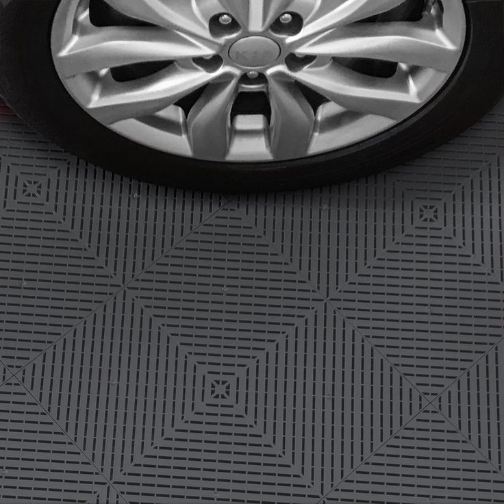 A single green leaf against a white background.