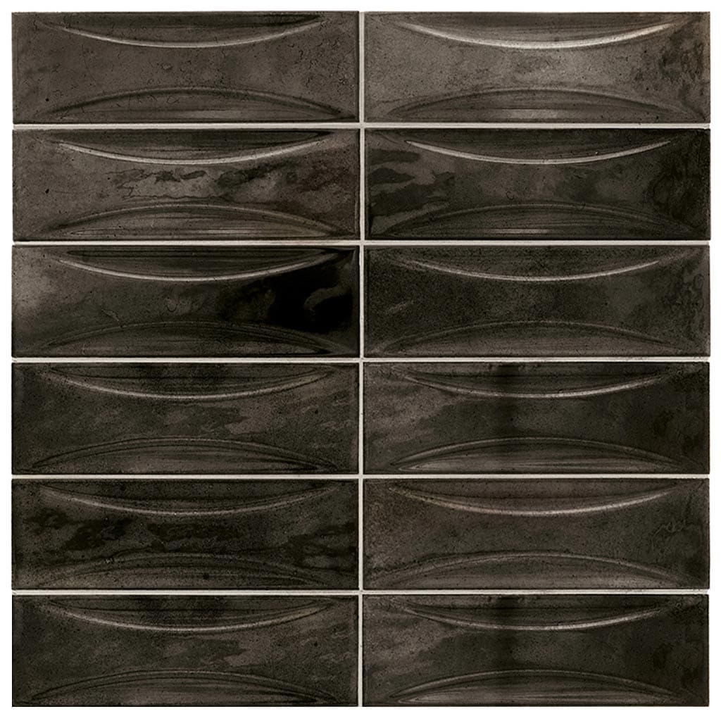 A single green leaf against a white background.