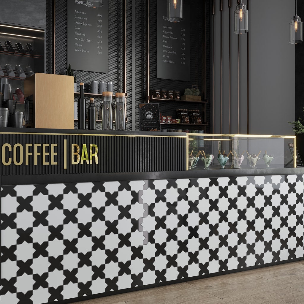 A single green leaf against a white background.