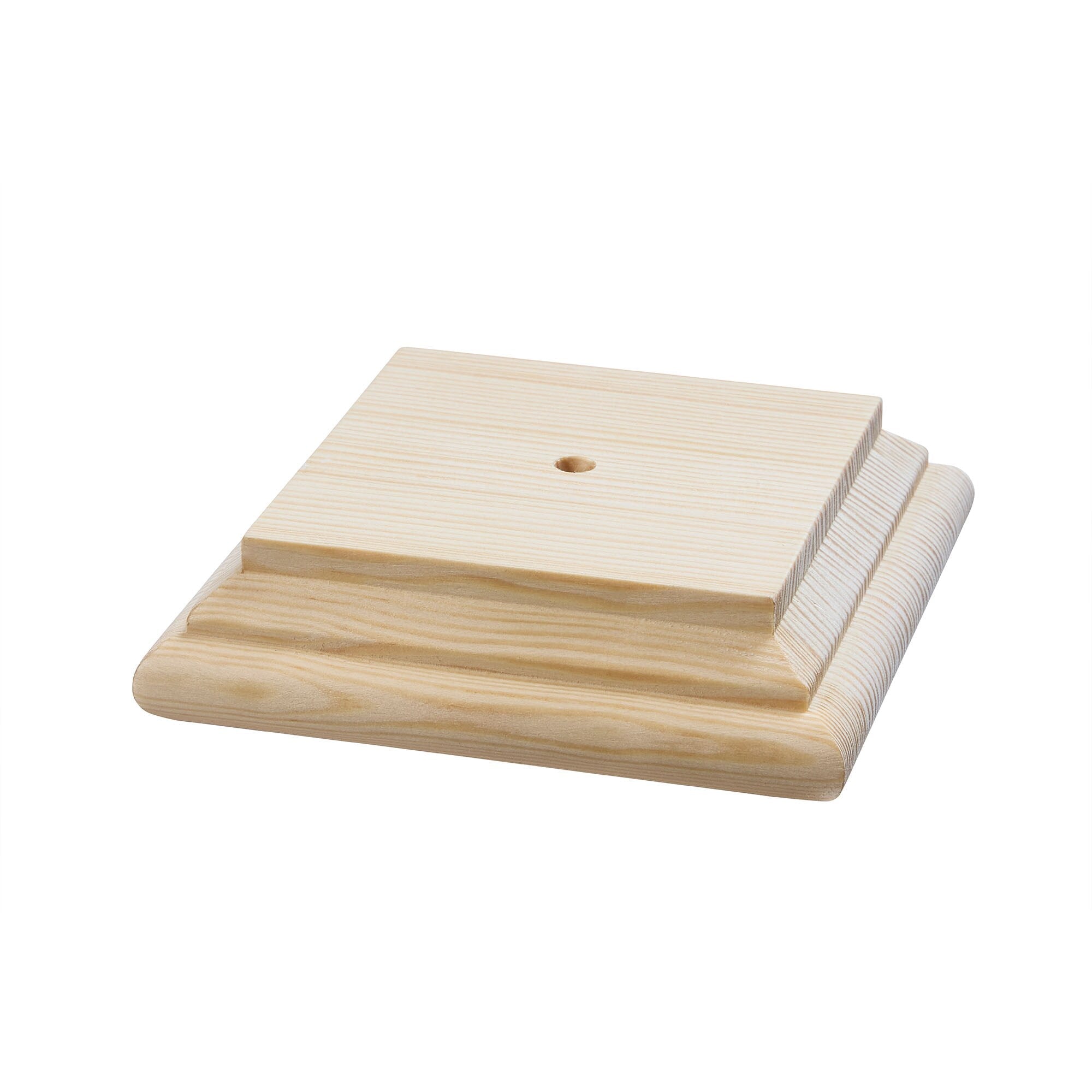 A single green leaf against a white background.