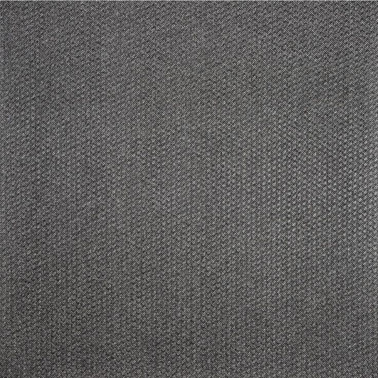 A single green leaf against a white background.