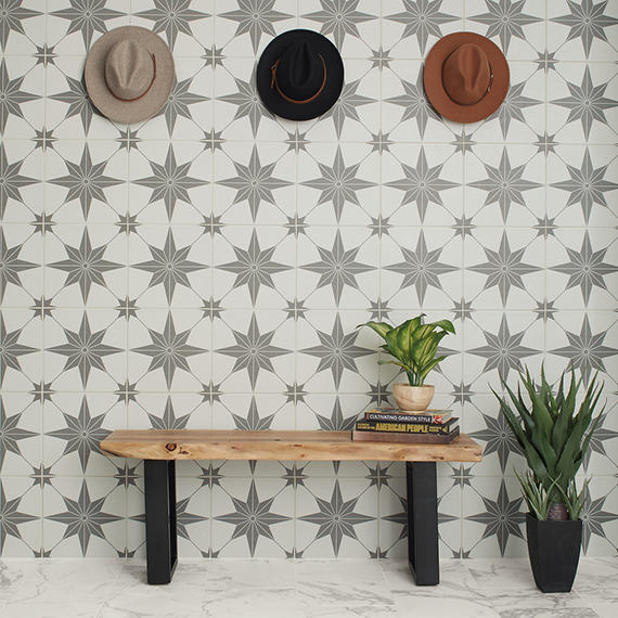 A single green leaf against a white background.