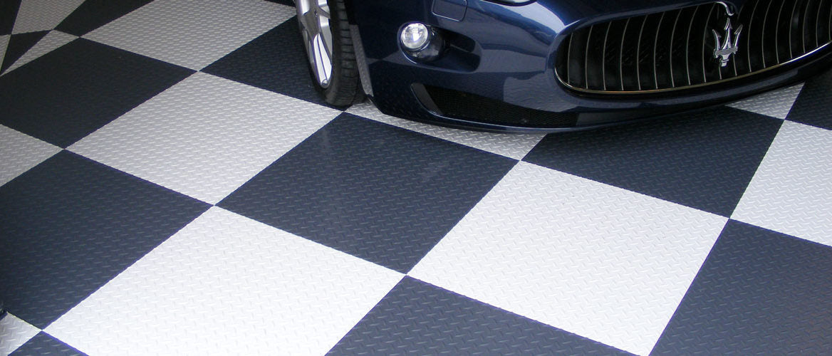 A single green leaf against a white background.