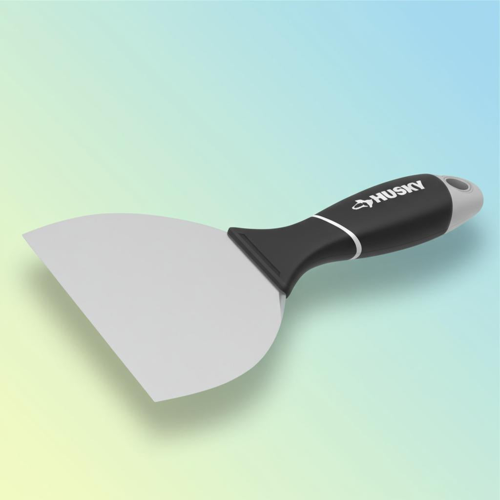 A single green leaf against a white background.