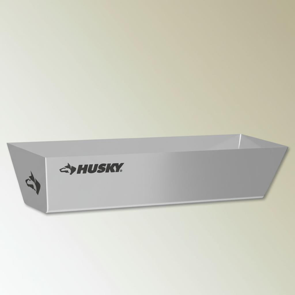 A single green leaf against a white background.