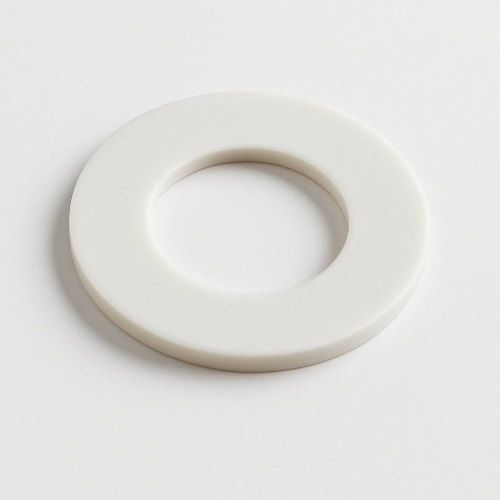 A single green leaf against a white background.