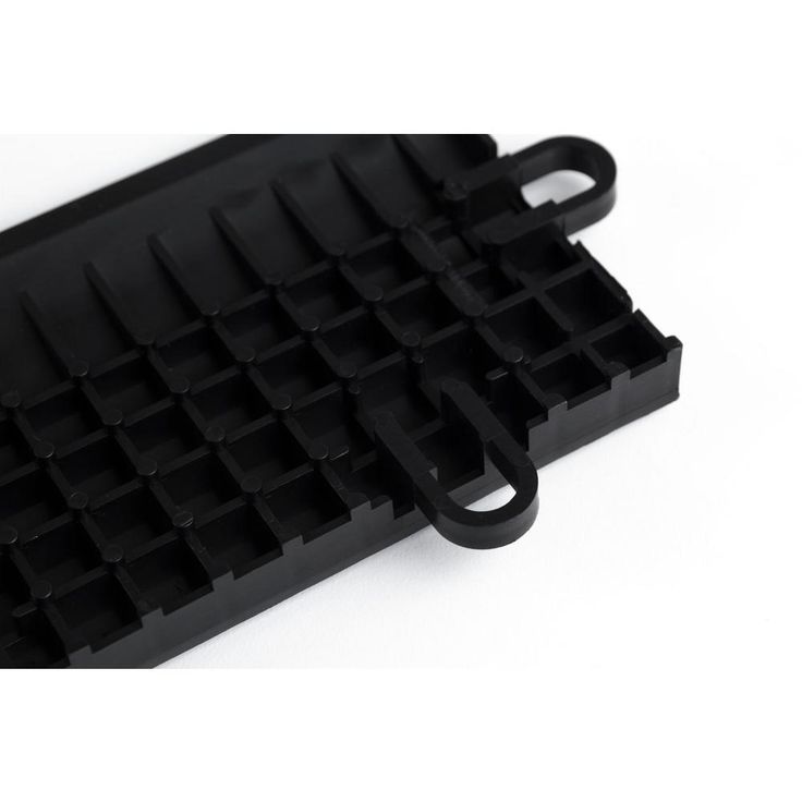 A single green leaf against a white background.