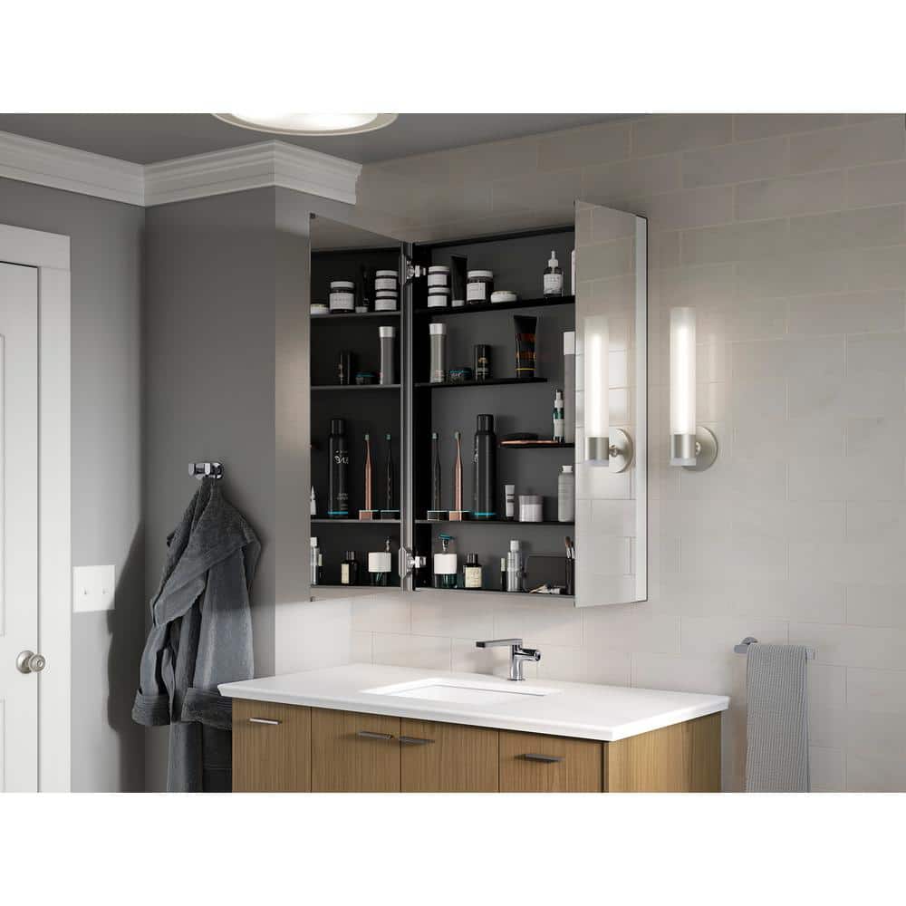 A single green leaf against a white background.