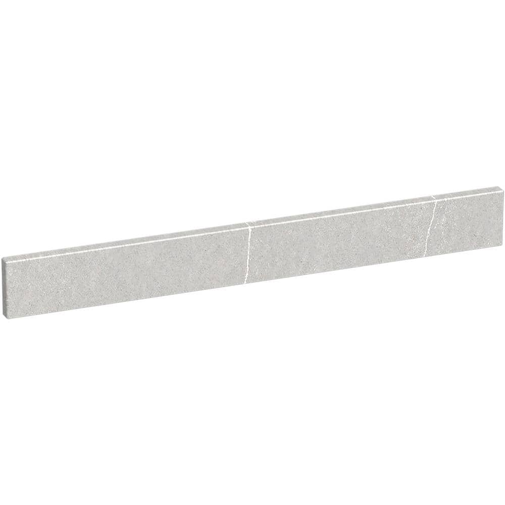 A single green leaf against a white background.