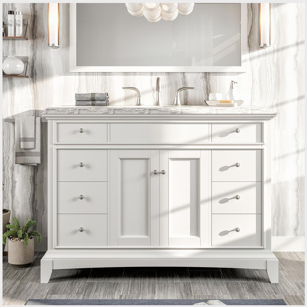 A single green leaf against a white background.