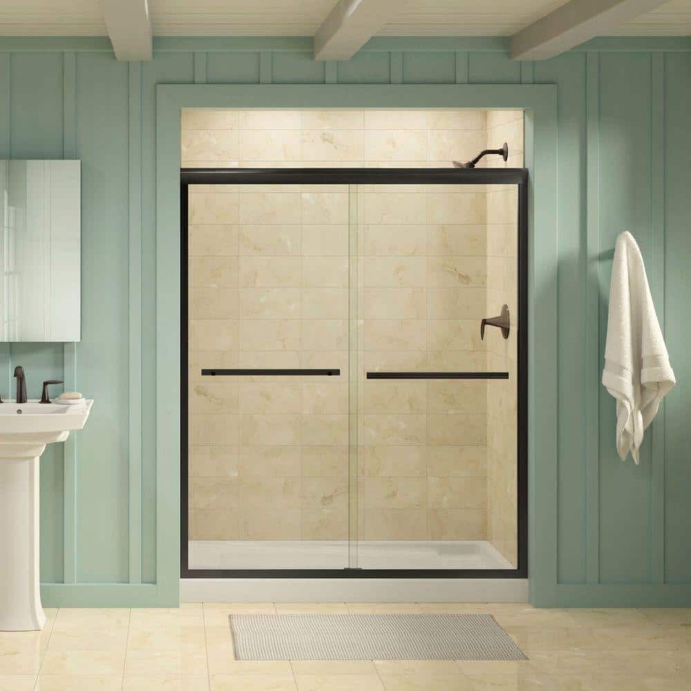 A single green leaf against a white background.