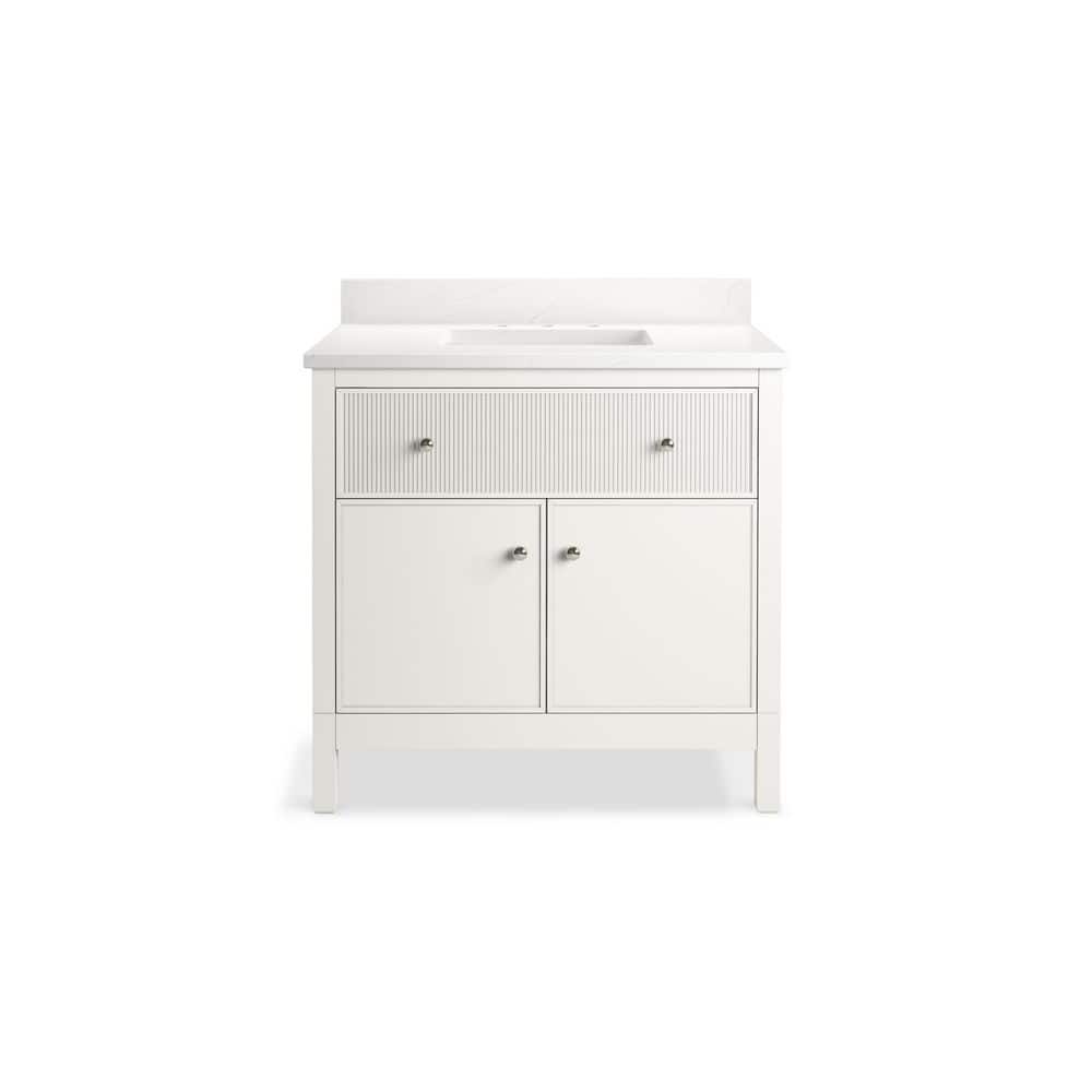 A single green leaf against a white background.