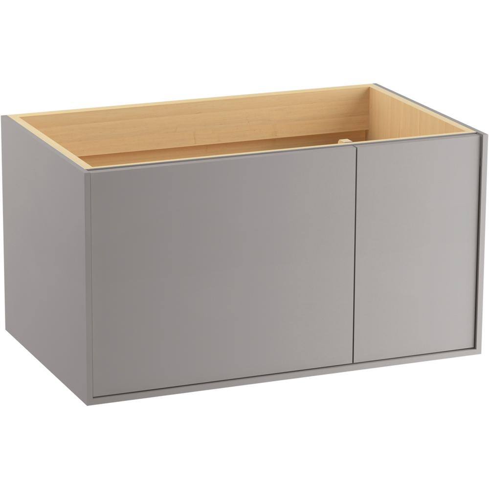 A single green leaf against a white background.