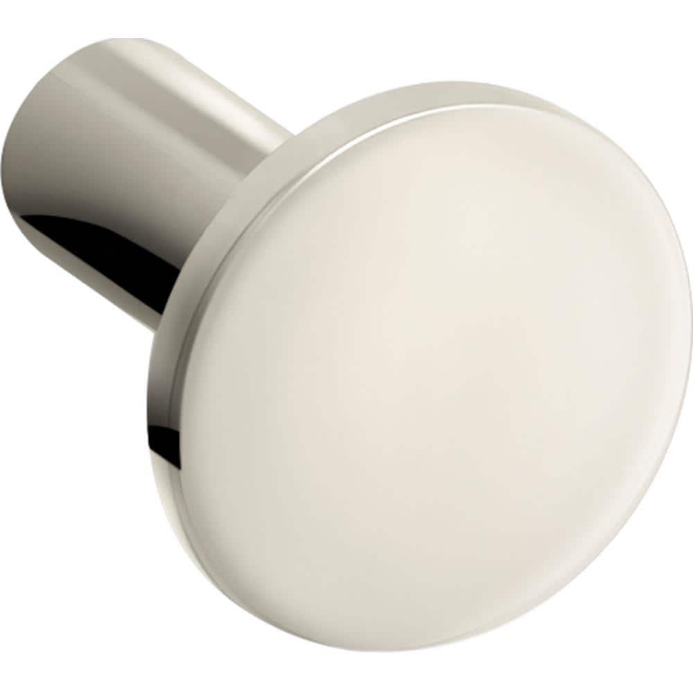 A single green leaf against a white background.