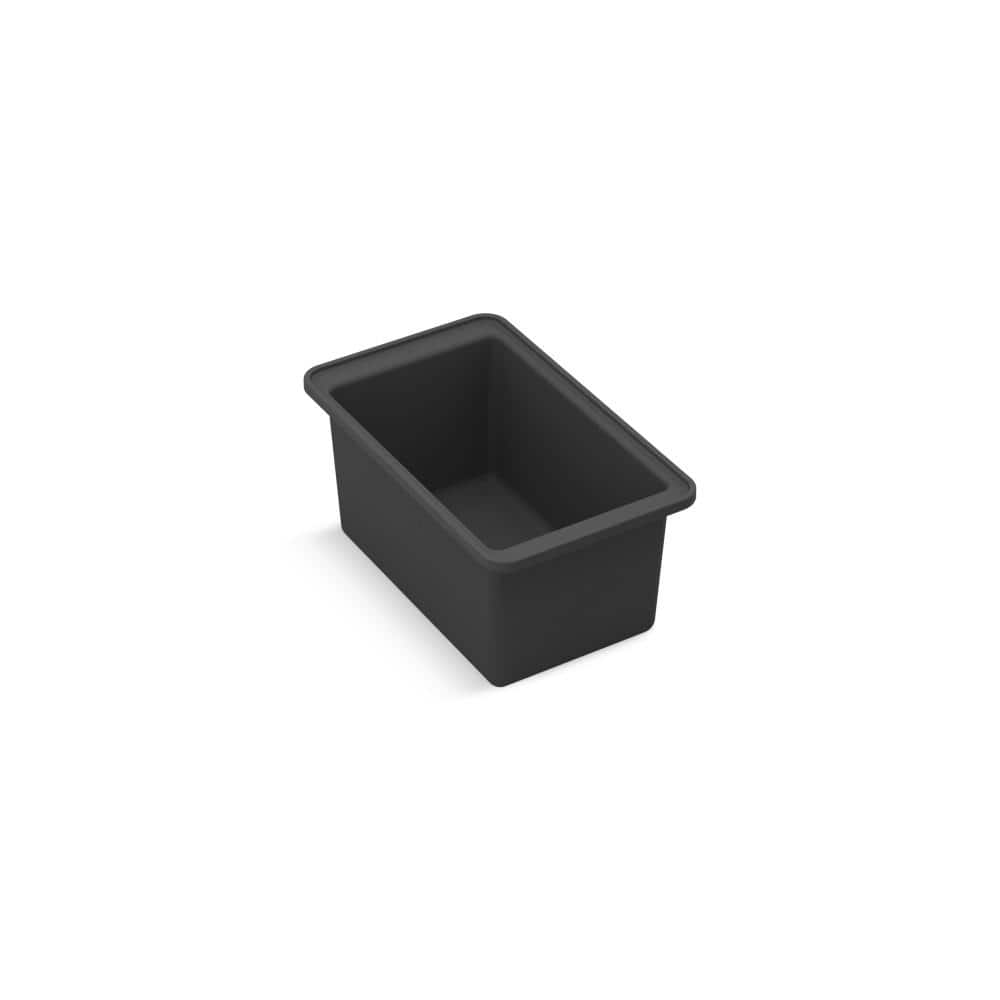 A single green leaf against a white background.