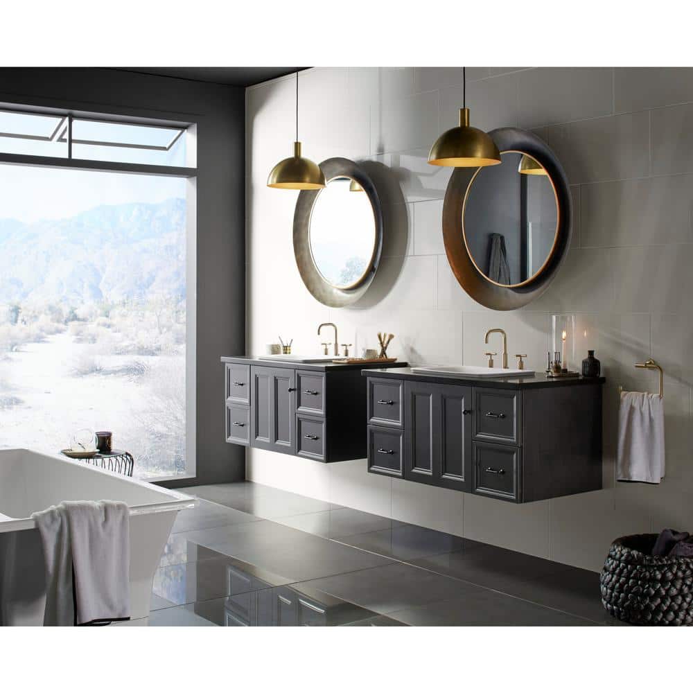 A single green leaf against a white background.