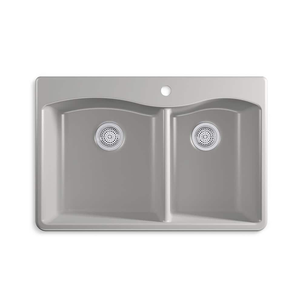 A single green leaf against a white background.