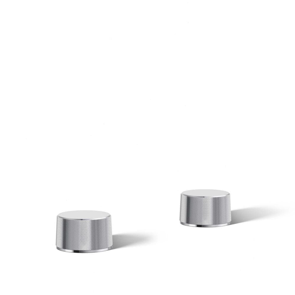 A single green leaf against a white background.