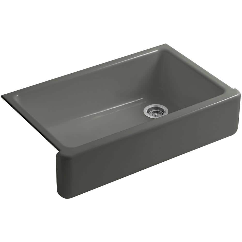 A single green leaf against a white background.