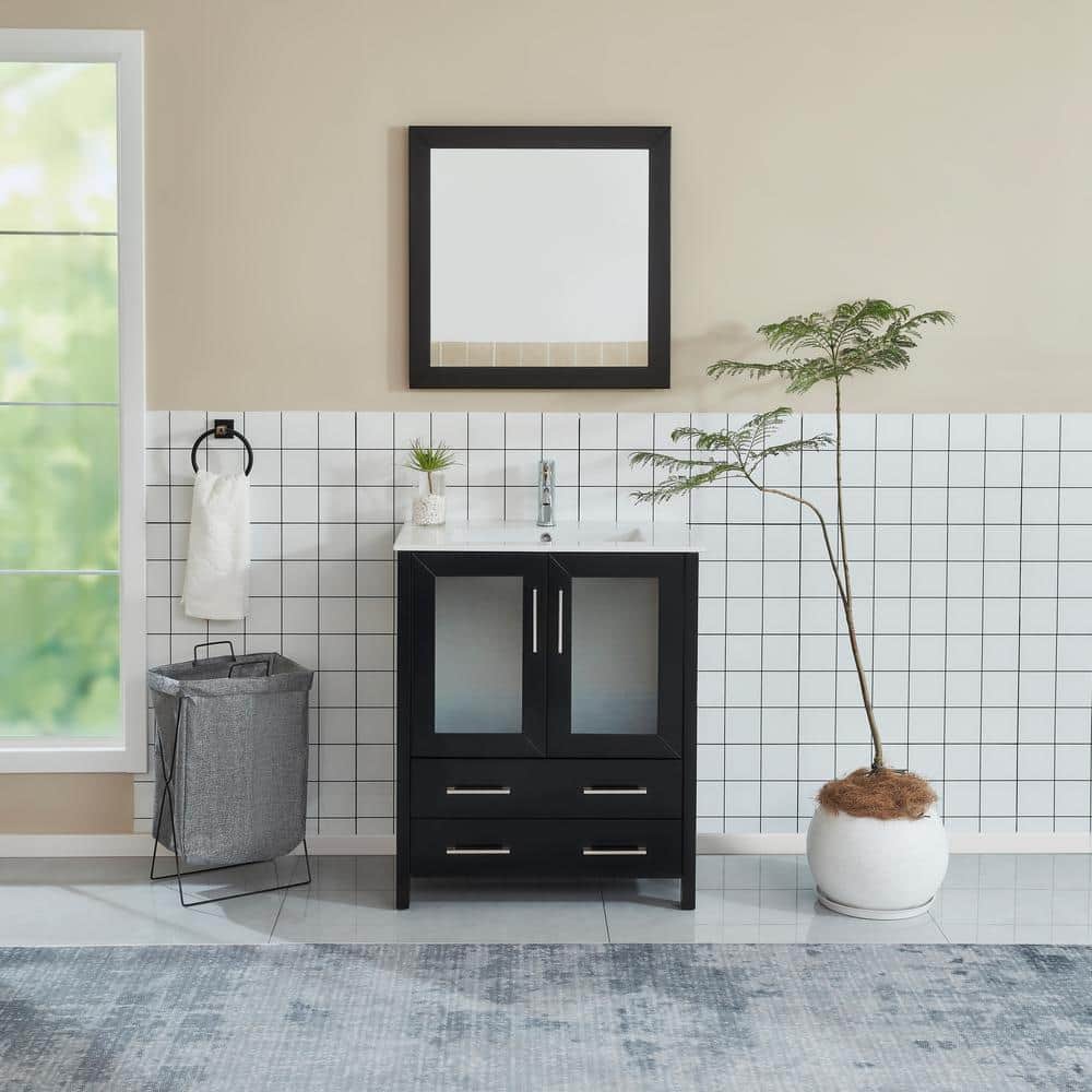A single green leaf against a white background.