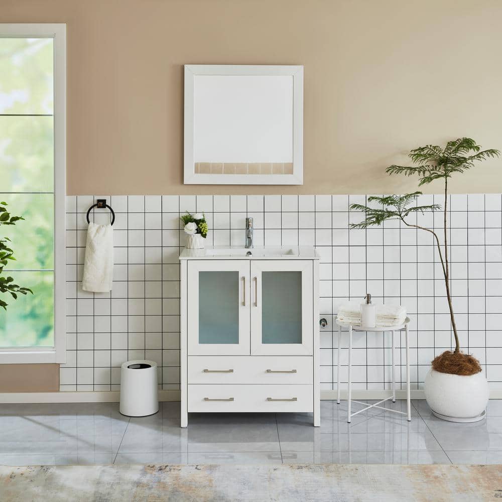 A single green leaf against a white background.