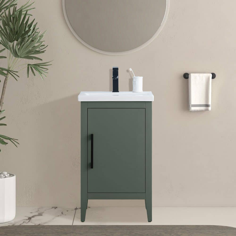 A single green leaf against a white background.