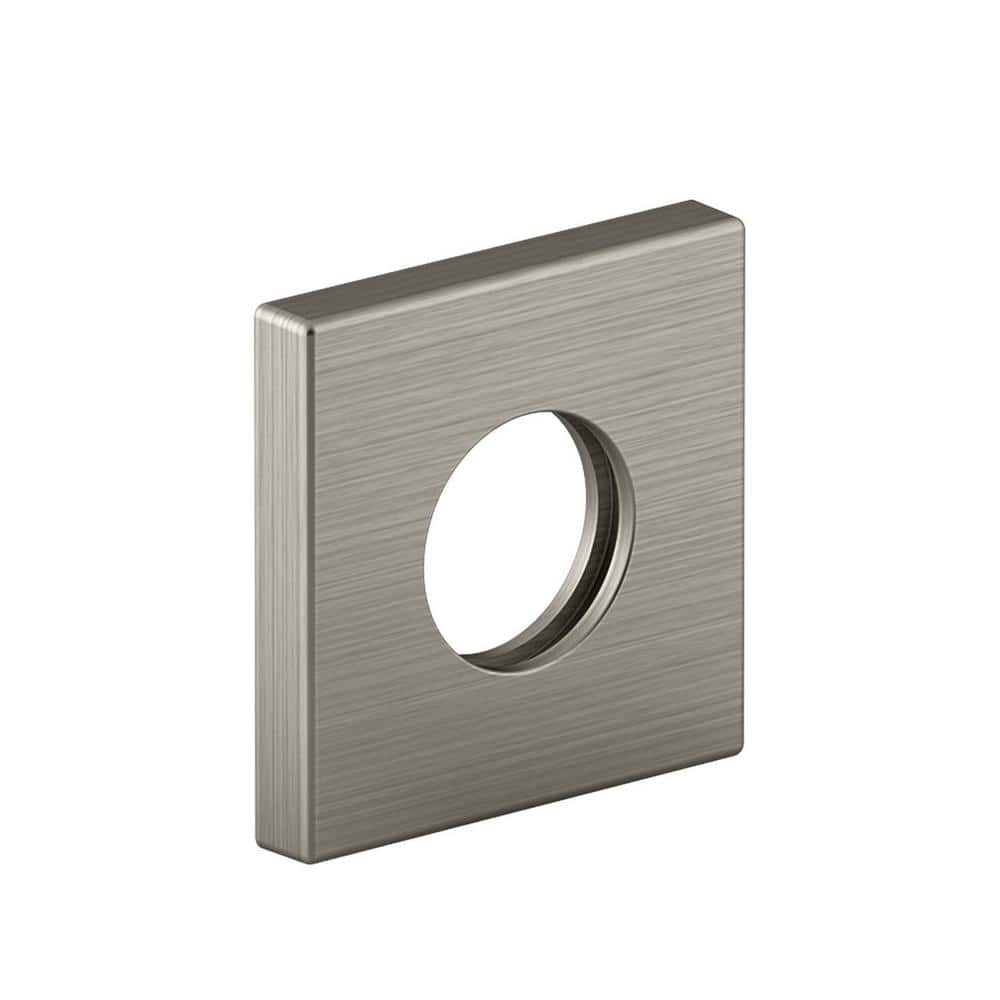 A single green leaf against a white background.