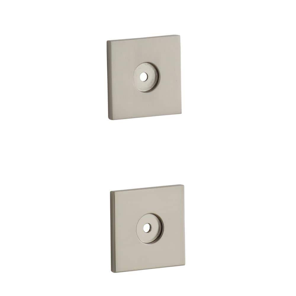 A single green leaf against a white background.