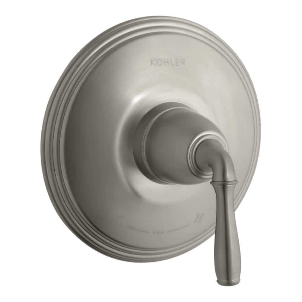 A single green leaf against a white background.