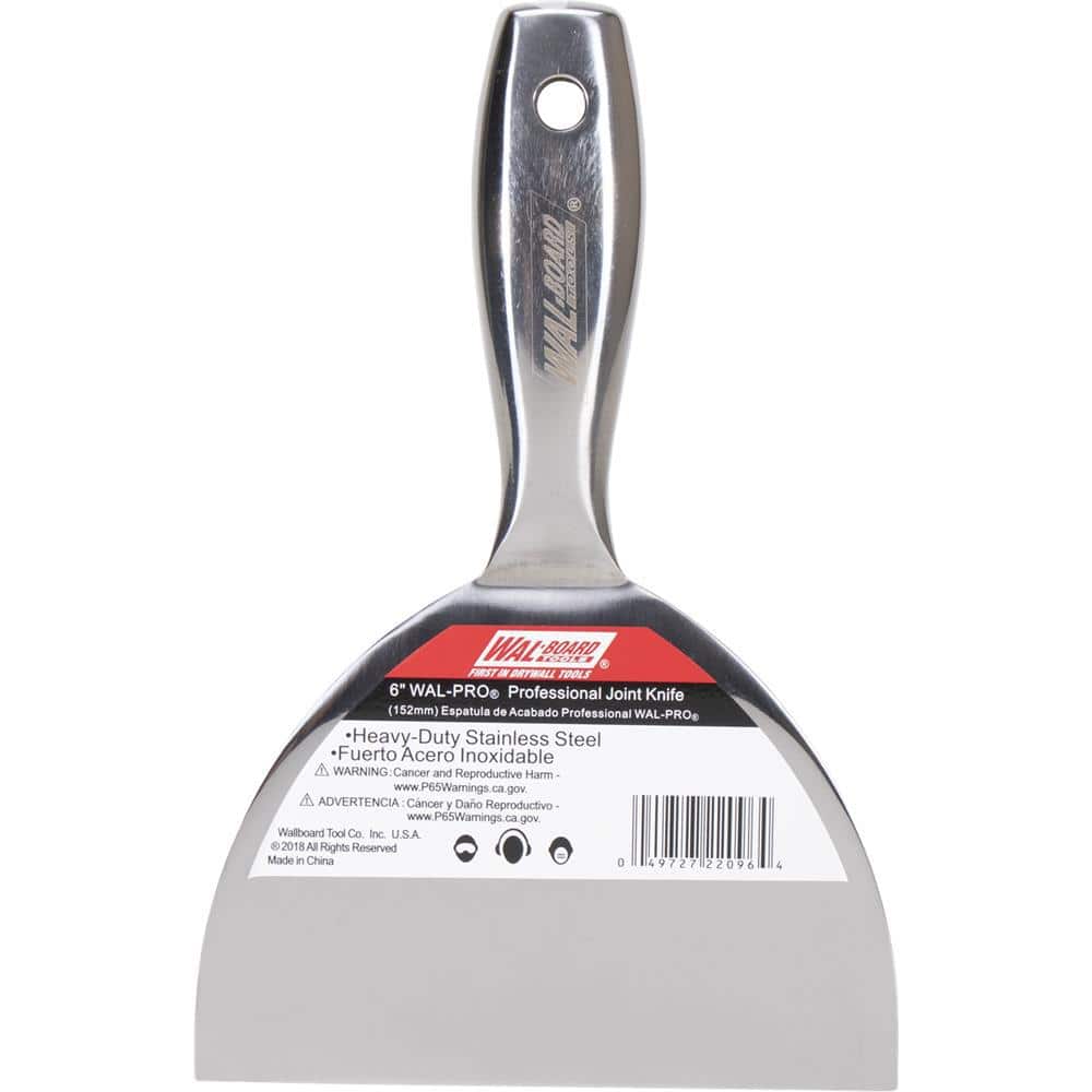 A single green leaf against a white background.