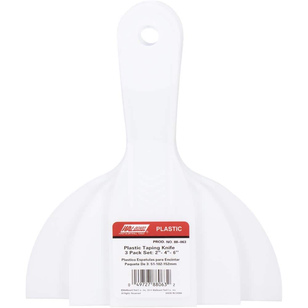 A single green leaf against a white background.