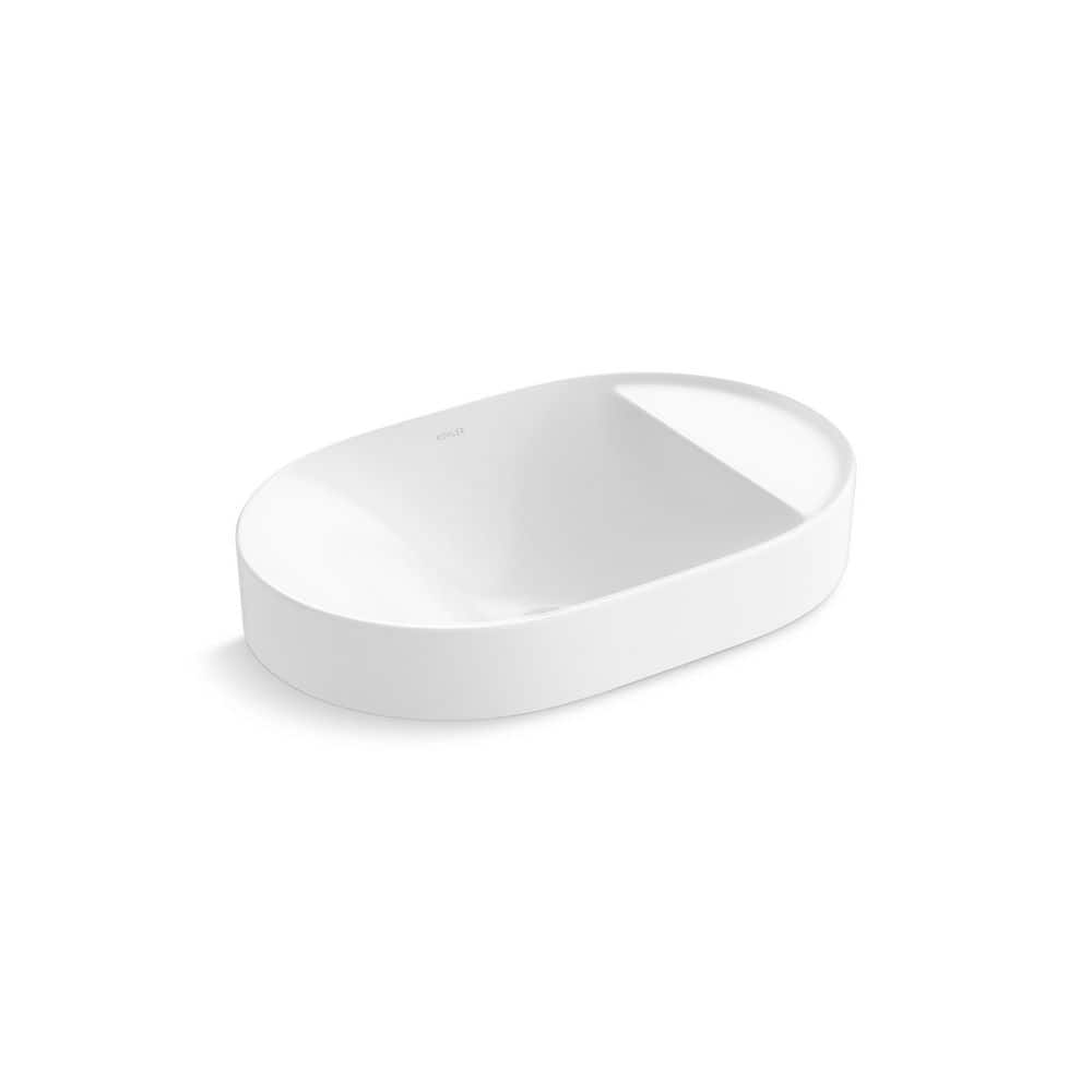 A single green leaf against a white background.