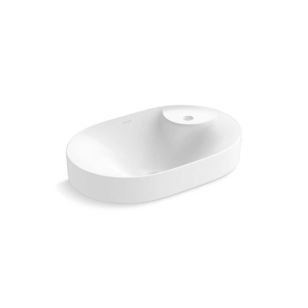 A single green leaf against a white background.