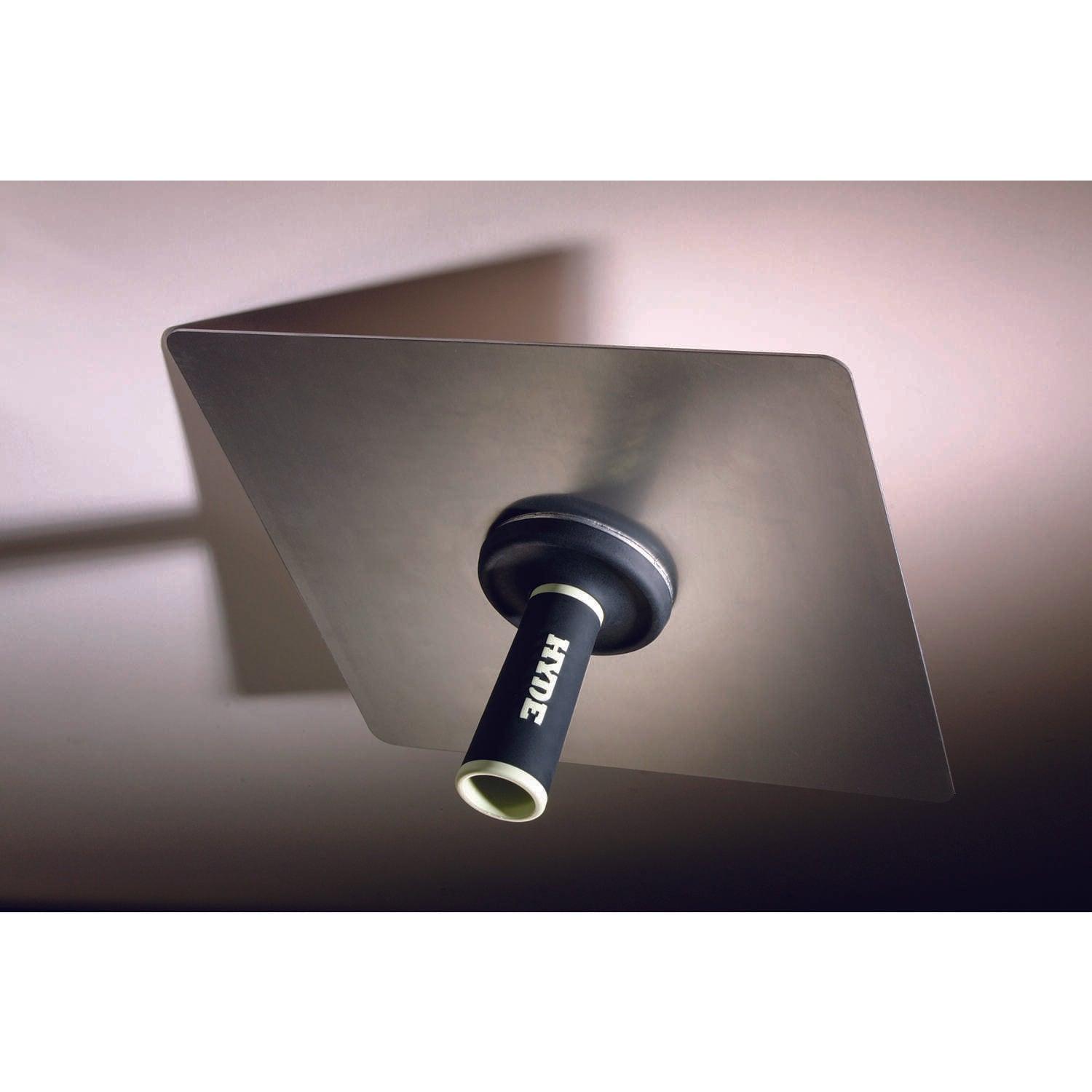 A single green leaf against a white background.