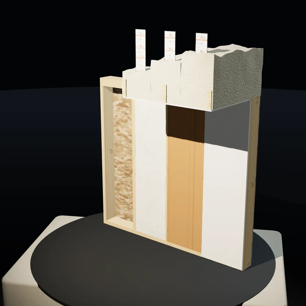A cut-open 2x6 wall section on a stone plinth with fiberglass batts, kraft facing and drywall stepped back bay by bay, and blown-in attic insulation at three depths above.