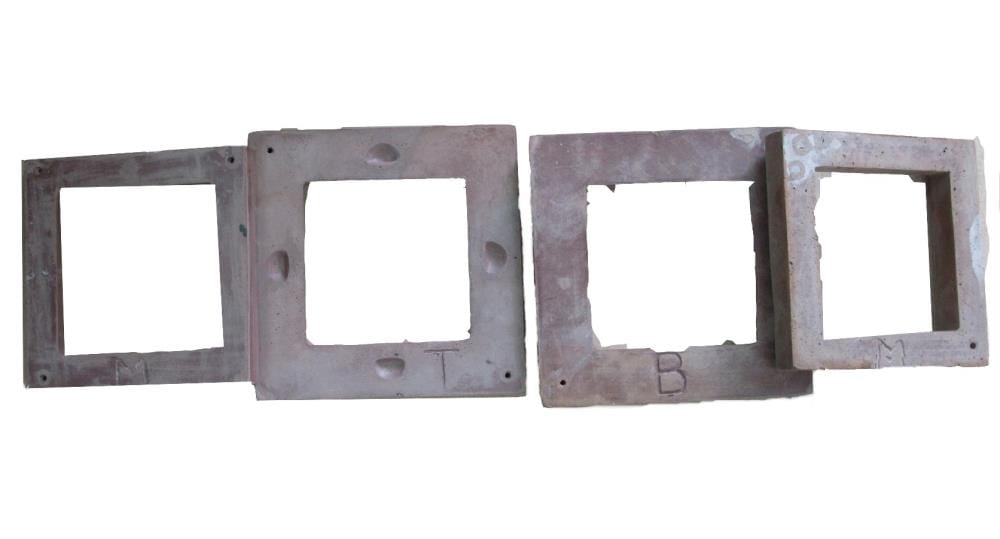 A single green leaf against a white background.