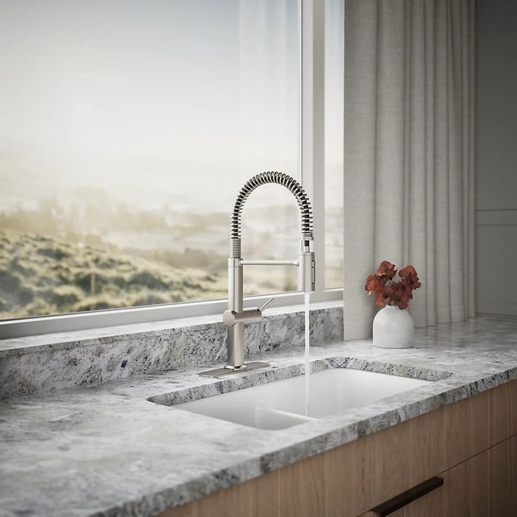 A single green leaf against a white background.
