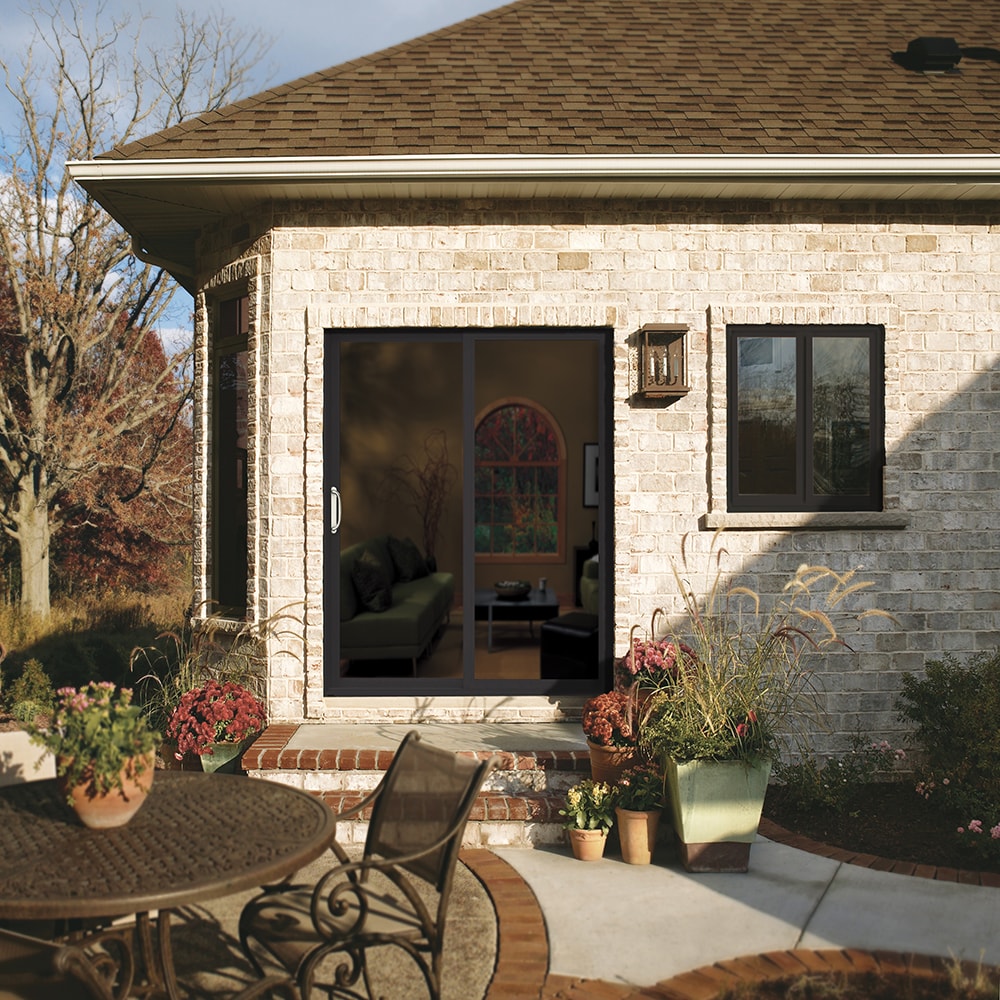 JELD-WEN FiniShield V-2500 72-in x 80-in 4-9/16-in Low-E Argon Bronze Vinyl Left-Hand Sliding Double Patio Door with Screen