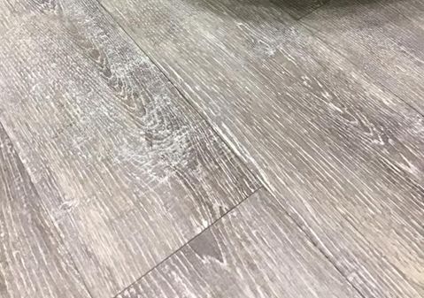 TrafficMaster Sandpiper Oak 6 in. W x 36 in. L Luxury Vinyl Plank Flooring (24 sq. ft. / case)