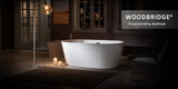 WOODBRIDGE 67 in. L x 31.5 in. W Acrylic Freestanding Flat-Bottom Soaking Bathtub, White, with Brushed Nickel Overflow & Drain
