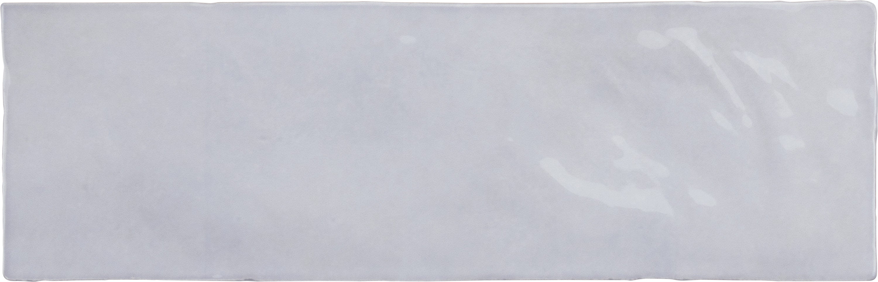 A single green leaf against a white background.